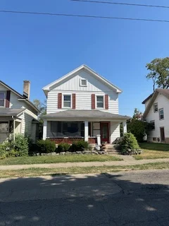 Before: Exterior of 1110 Arbor Ave, Dayton OH before purchase